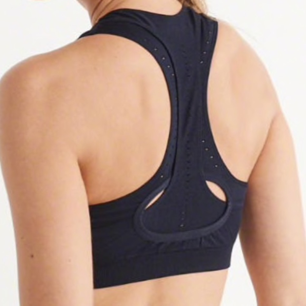 High neck navy blue sports bra. NWT.